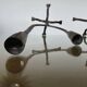 Pair of antique wrought iron candlesticks
