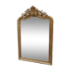 Louis XV style mirror in gilded wood and stucco, 20th century.