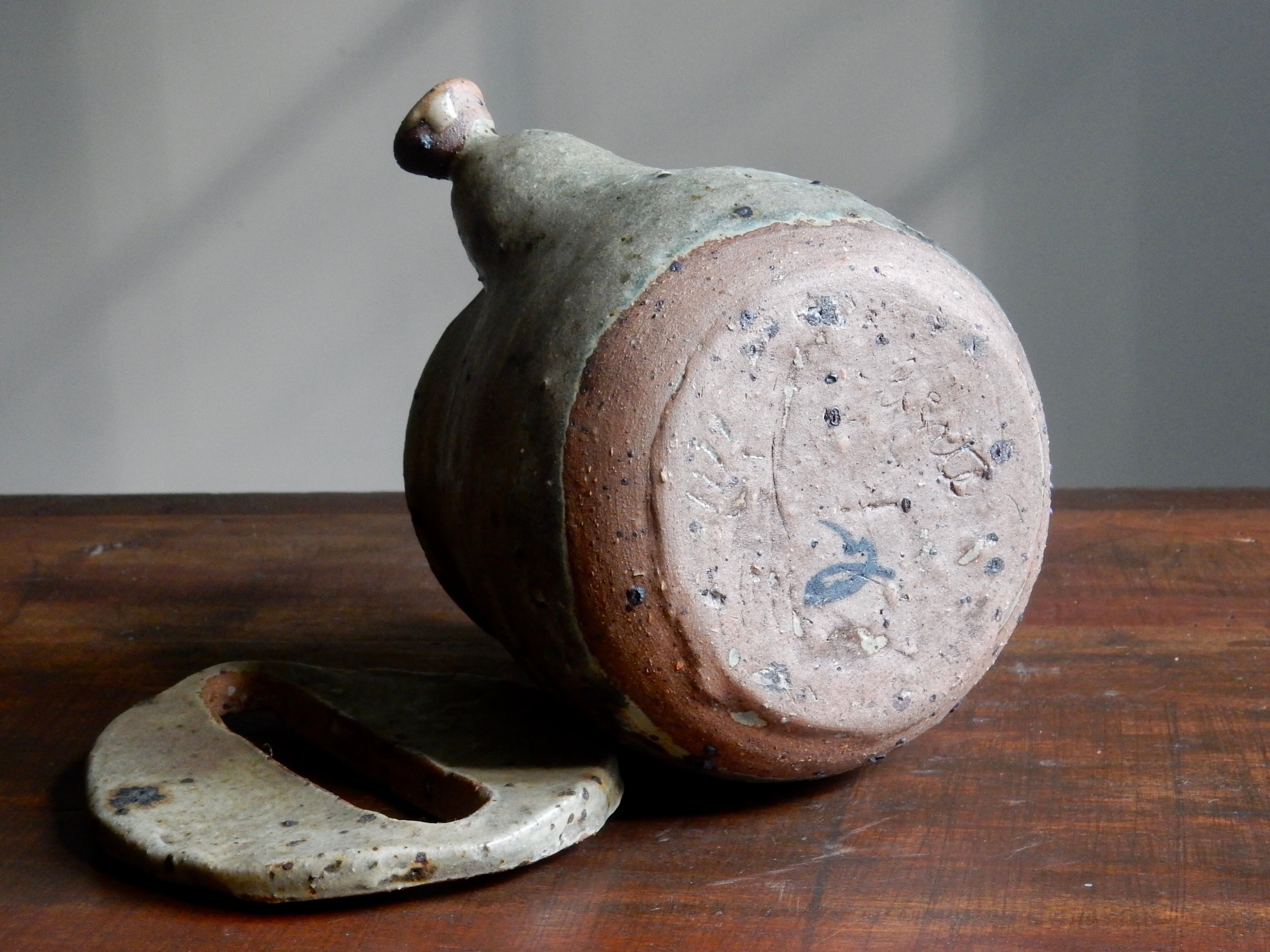 Homemade teapot in pyrity sandstone