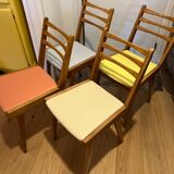 A set of 4 compass chairs from the 50s/60s