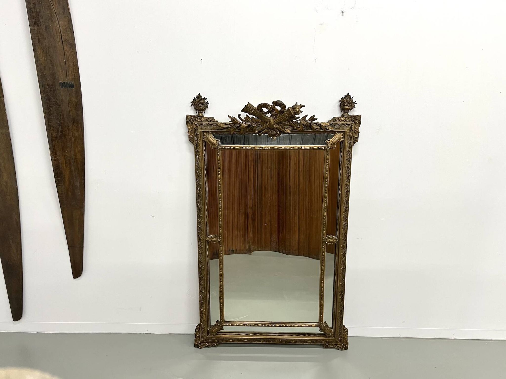 Large antique pediment mirror with mouldings.