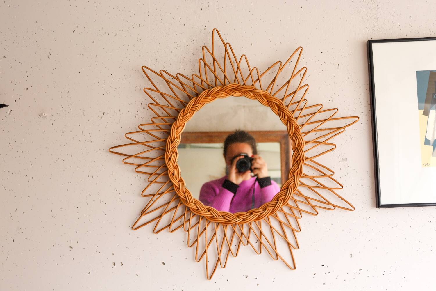 Vintage sun mirror in woven rattan