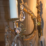 Old brass sconce with glass drops