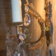 Old brass sconce with glass drops