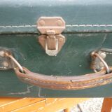 Green cardboard suitcase
