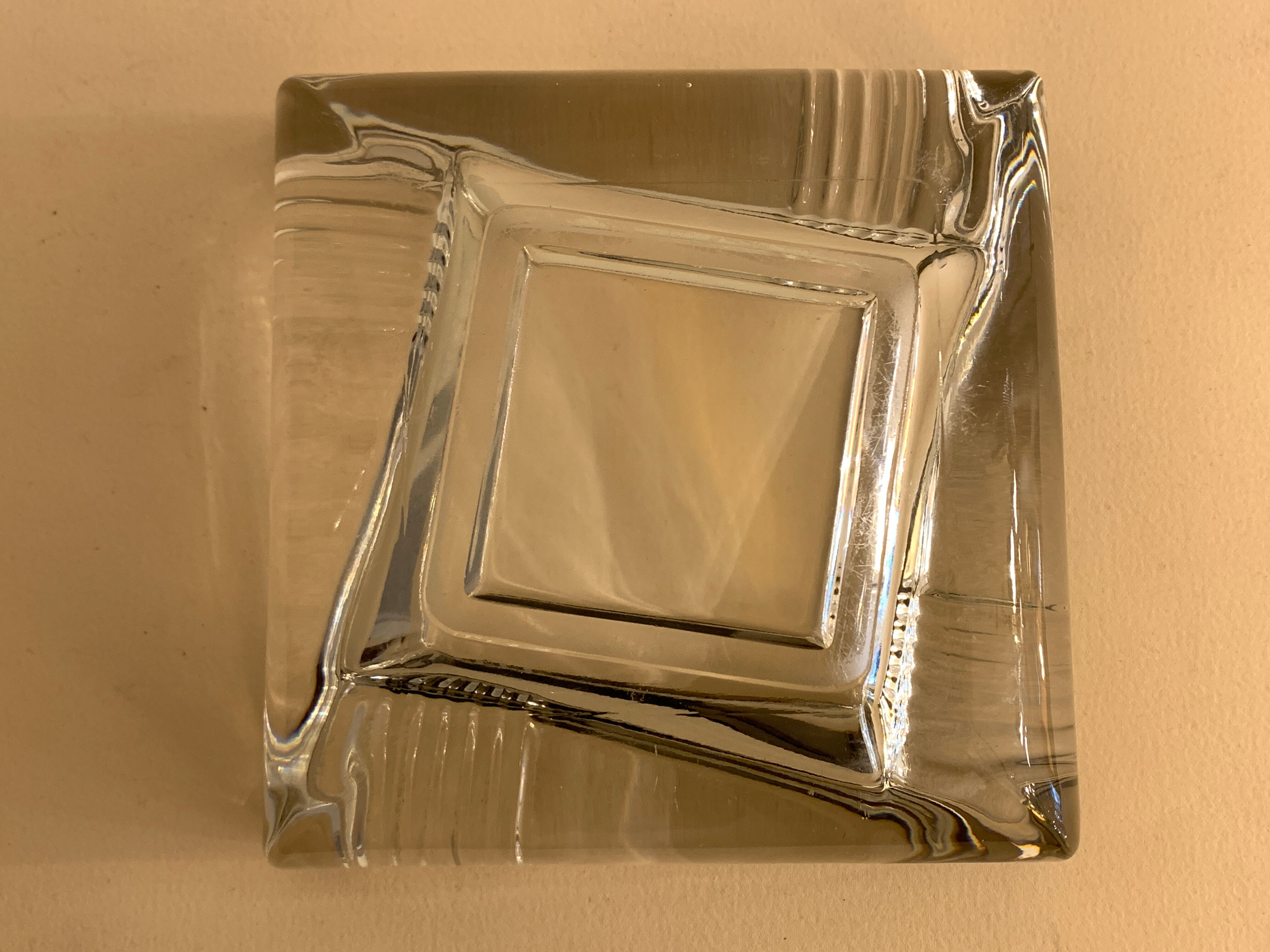 Transparent moulded glass ashtray