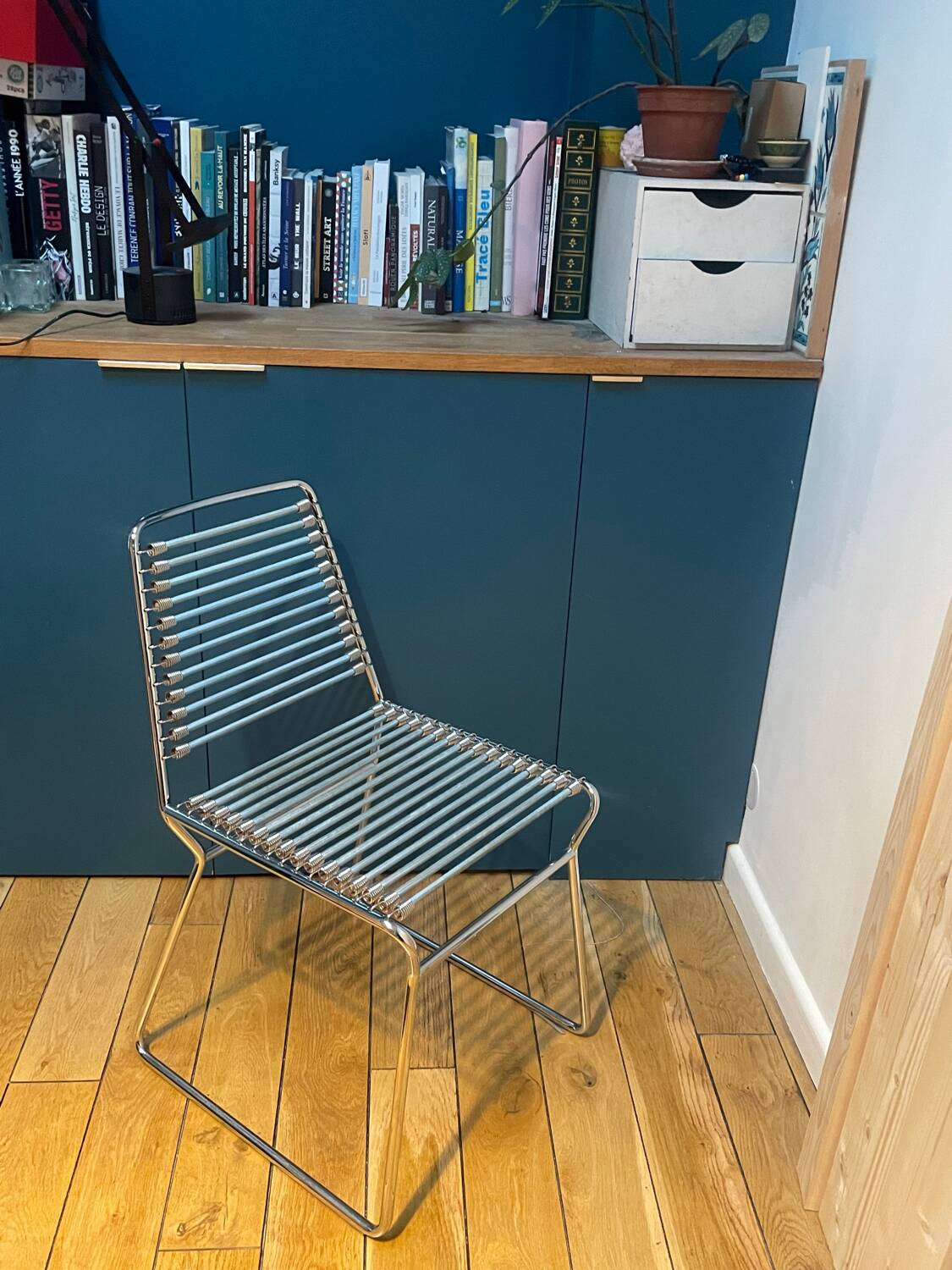 2 metal chairs with bungee cords