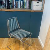 2 metal chairs with bungee cords