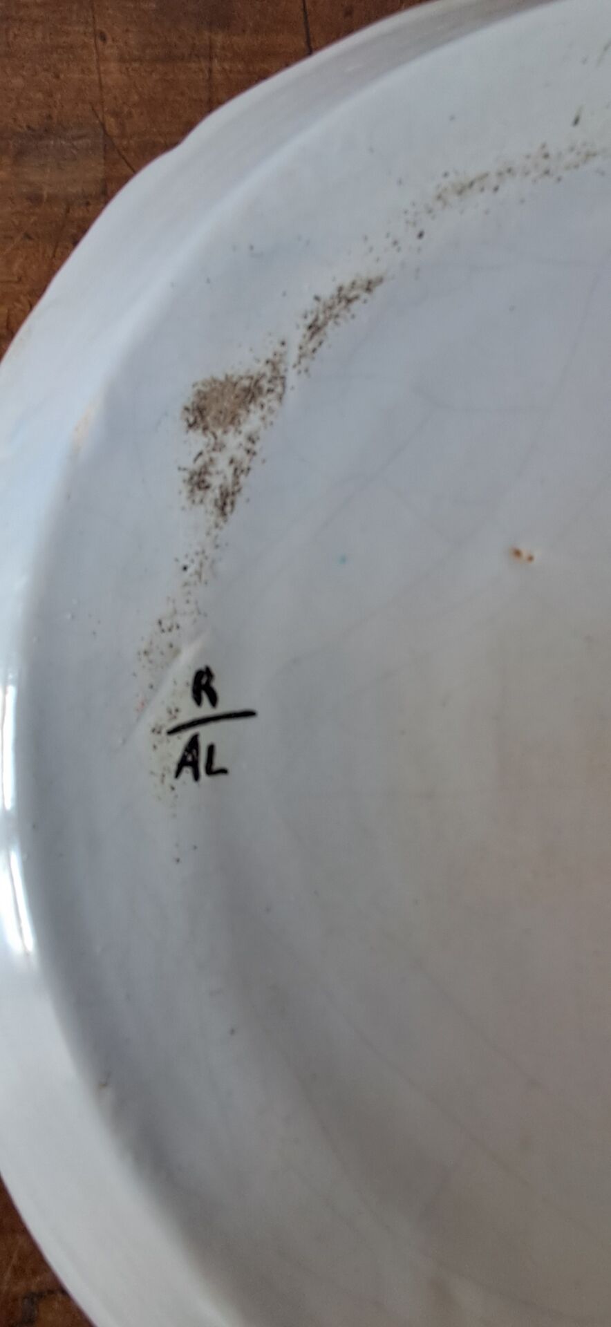 Decorative plate in the 18th-century style. Decoration of a stylised rooster.