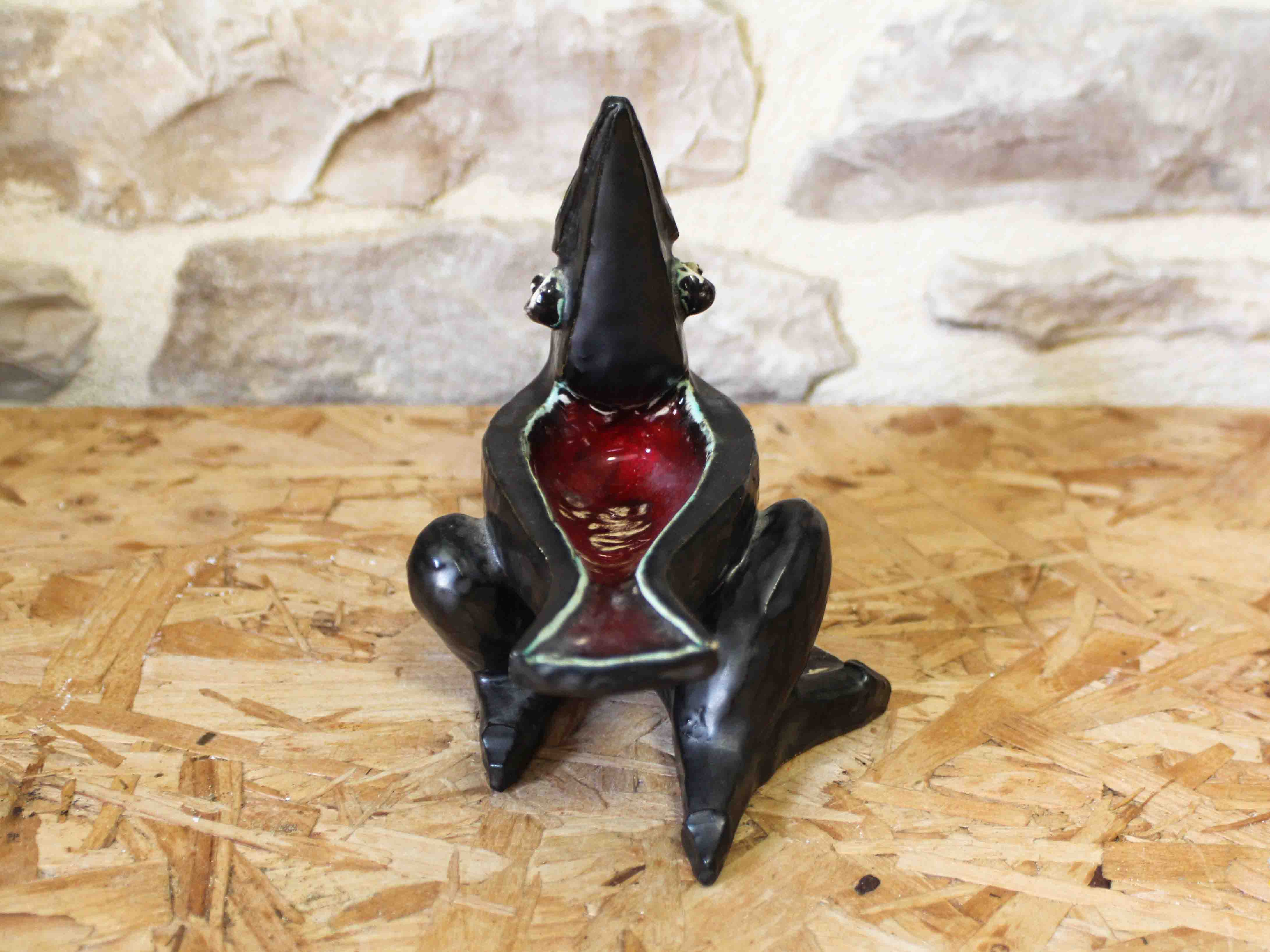 Glazed ceramic ashtray in the shape of a bird.