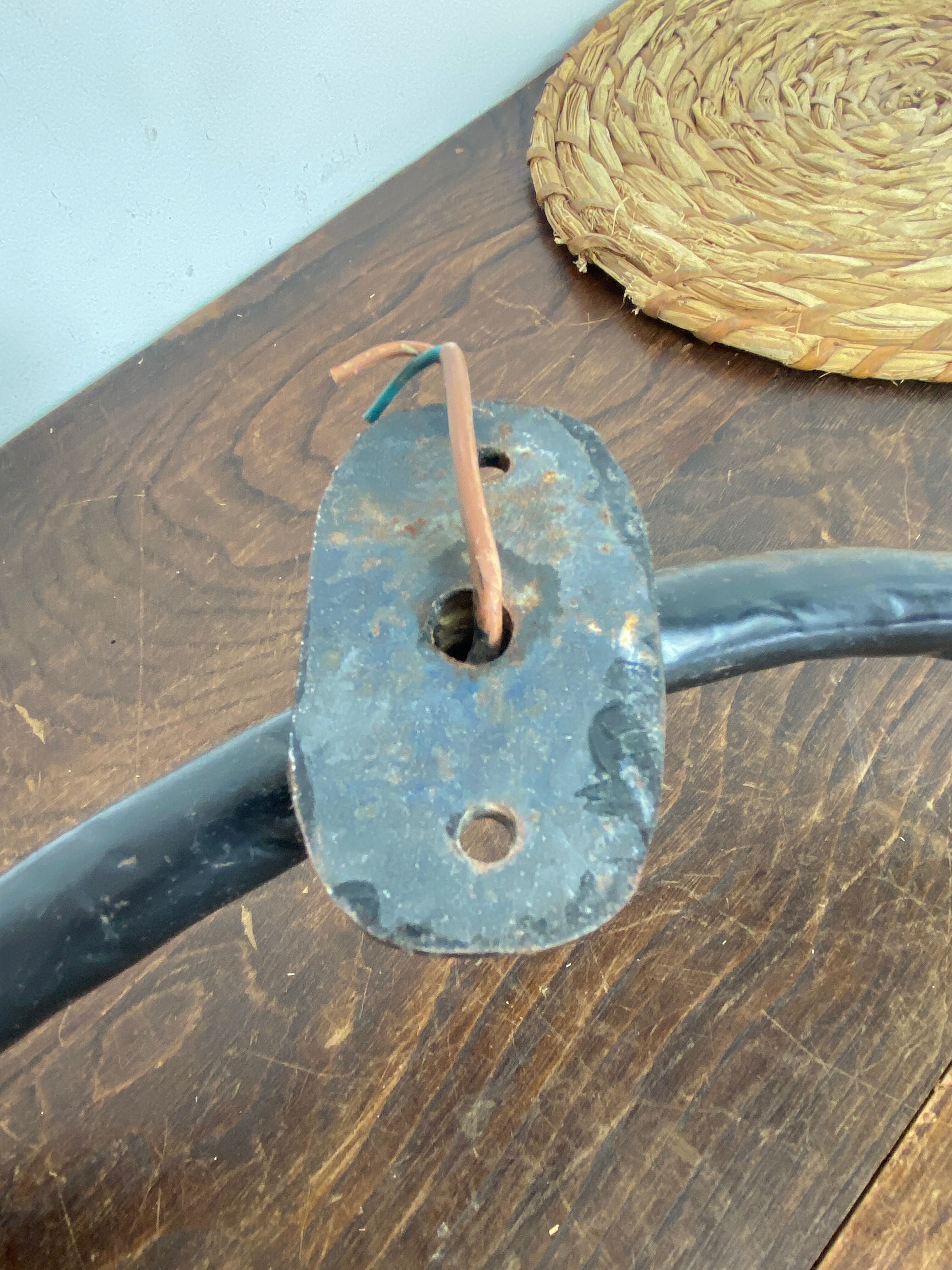 Wrought iron wall sconce