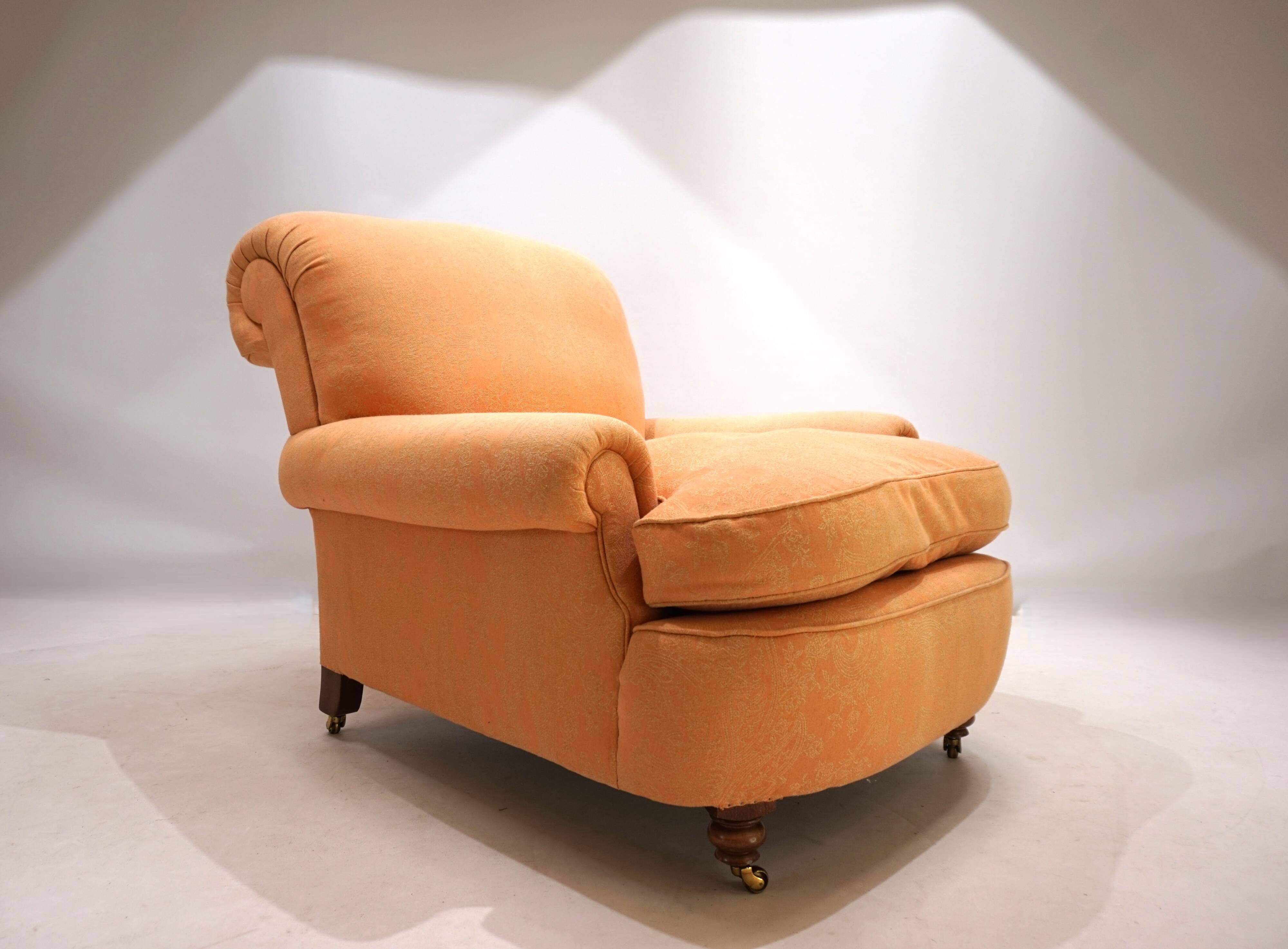 Deep seated armchair in the style of Howard & Sons