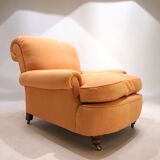 Deep seated armchair in the style of Howard & Sons