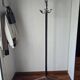 Chrome parrot coat rack with swivel head on a gas lift.