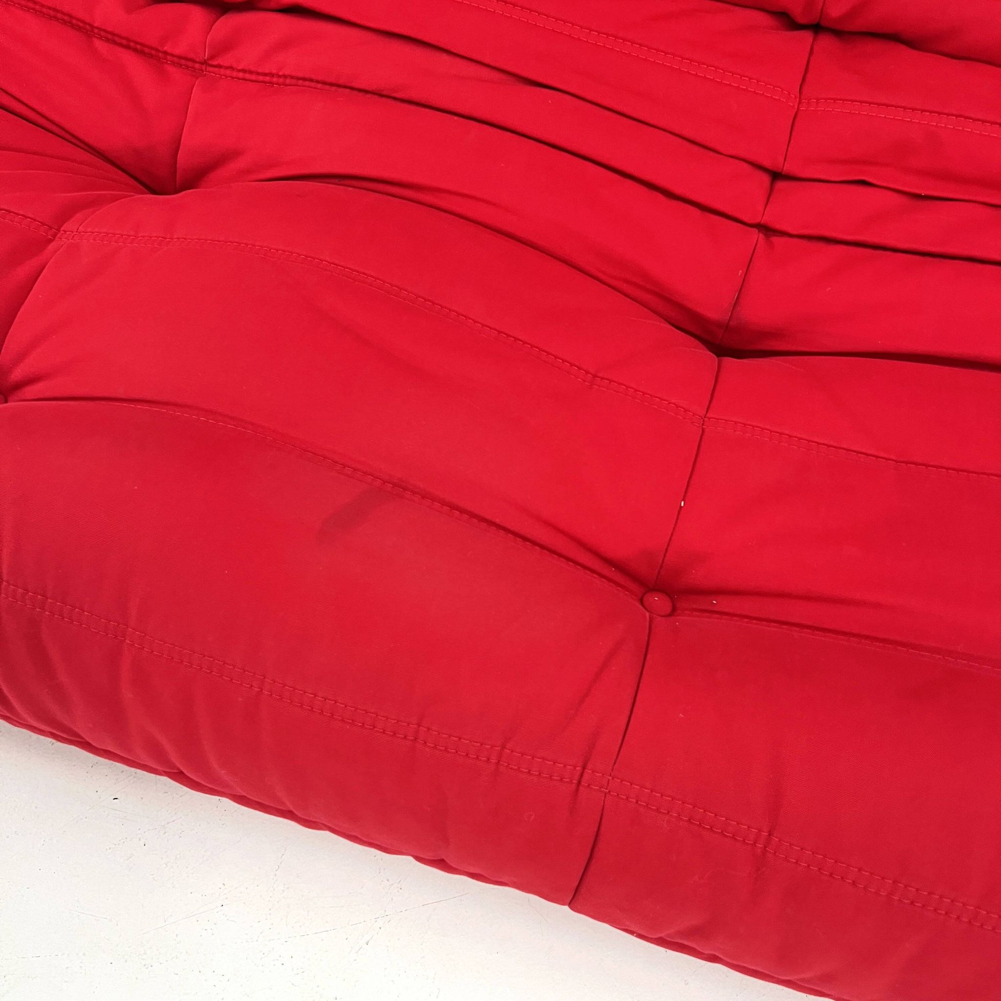 Togo 3-seater with red ottoman by Michel Ducaroy for Ligne Roset, 1970.