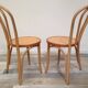 Pair of curved wooden bistro chairs