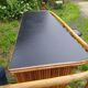 Vintage rattan bar with 1960s earthenware tile decor with 2 stools