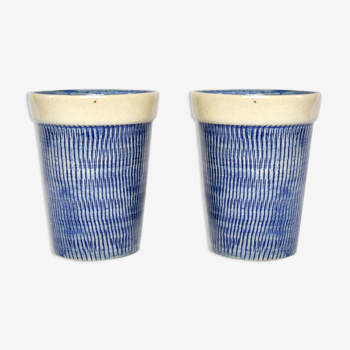 2 blue textured ceramic mugs