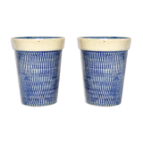 2 blue textured ceramic mugs