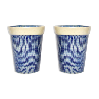 2 blue textured ceramic mugs