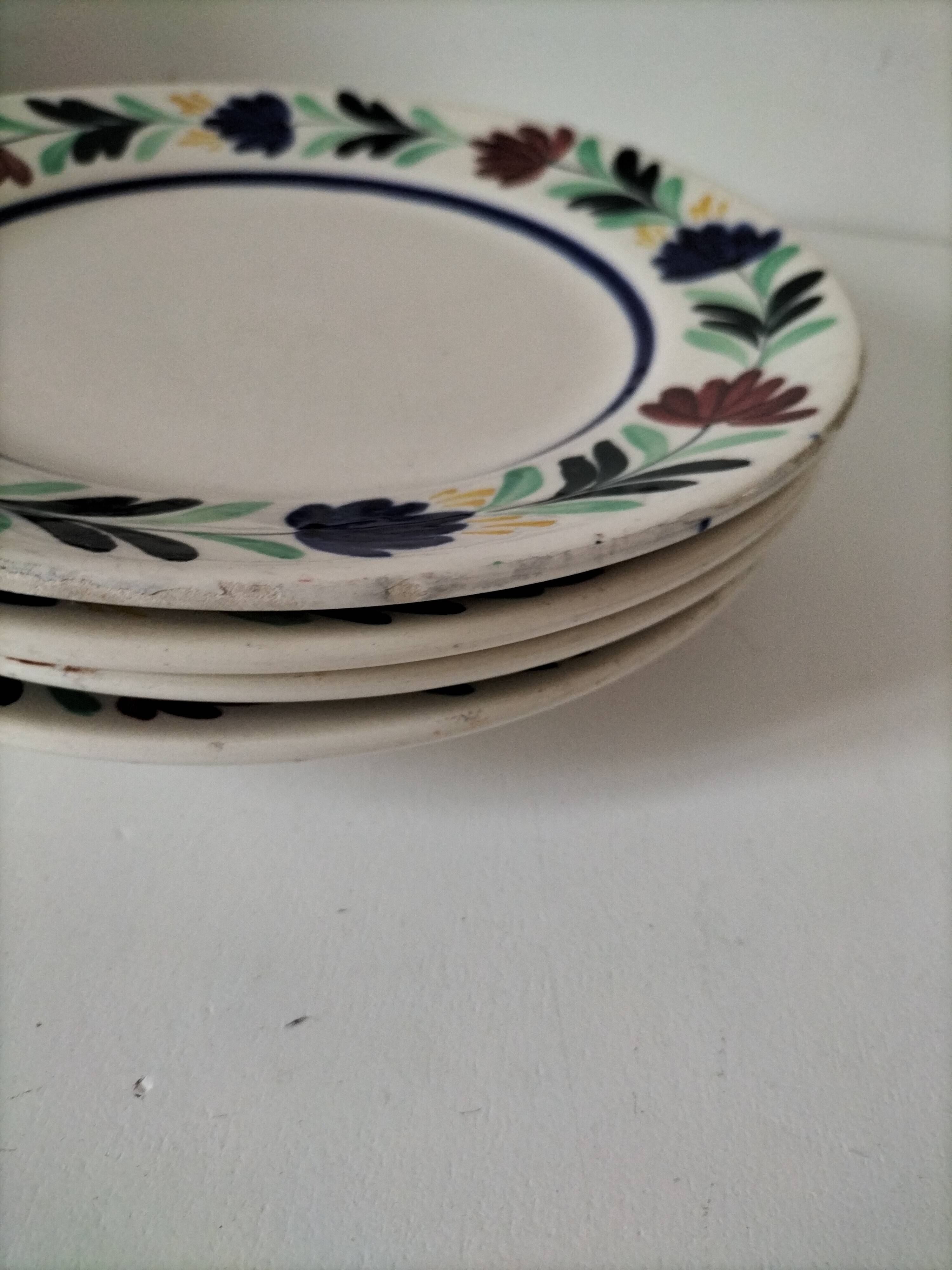 4 Longchamp plates with stylised floral decoration from the 1930s-50s.