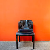 Pair of chairs in black lacquered wood Italy 70s