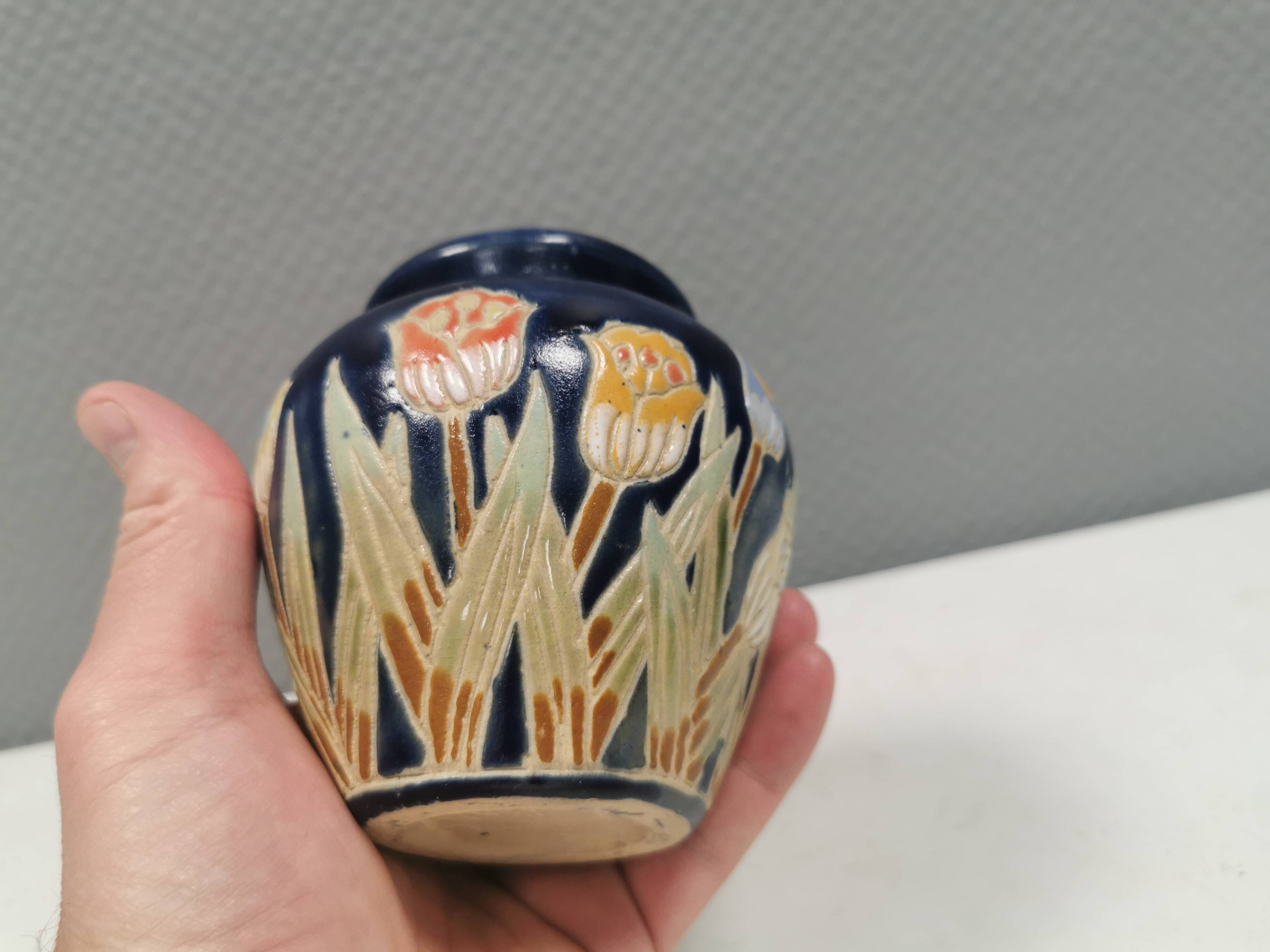Small delicious blue ceramic vase with floral decoration. Sweden 1970s
