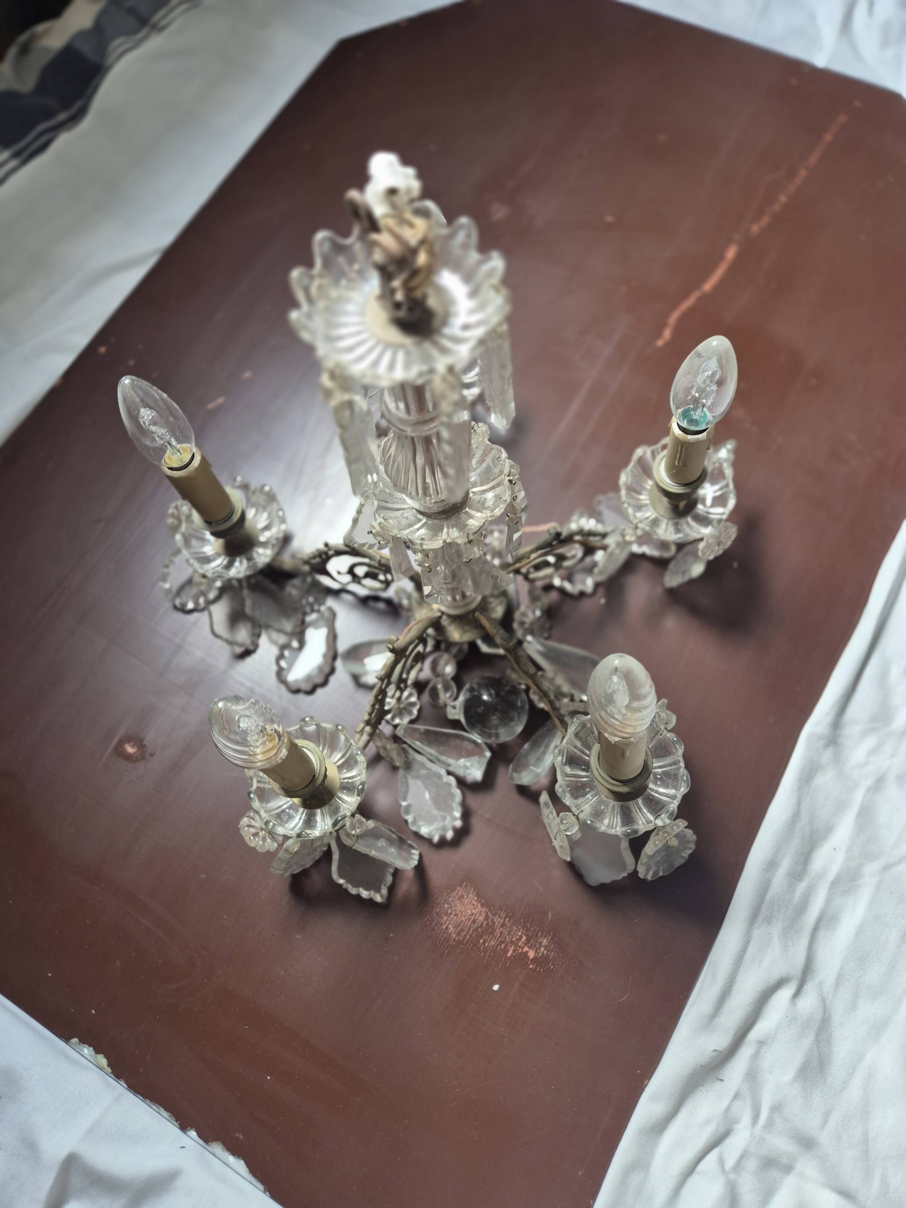 vintage pendant light from the 60s 70s with glass pendants and 5 candle holders