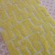 Moroccan Berber rug in lemon yellow with reliefs