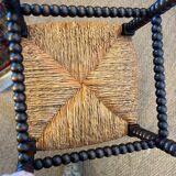 Corner chair in turned wood and straw