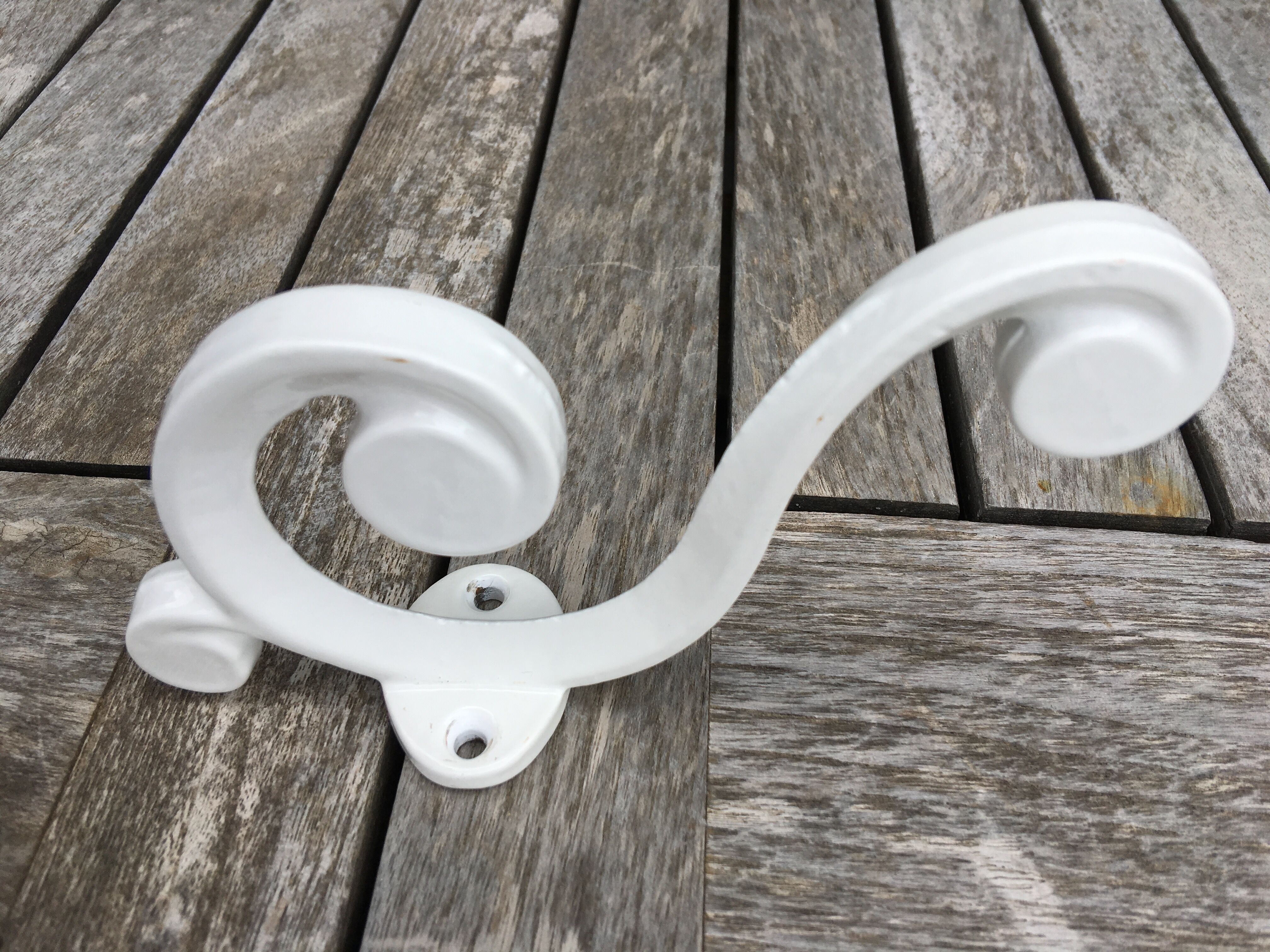 Enamelled cast iron hanger, circa 1950