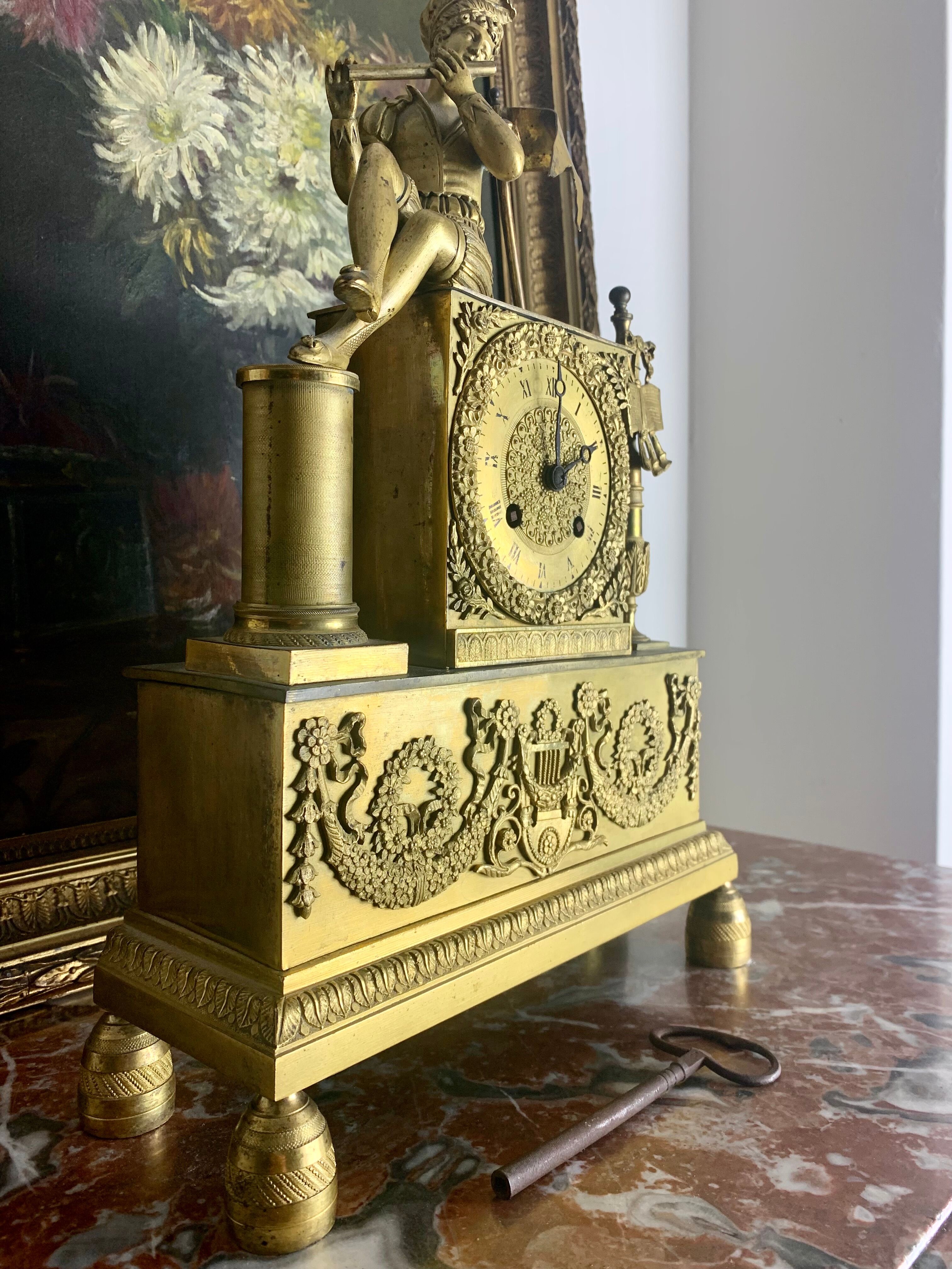 Period clock restoration in gilded bronze