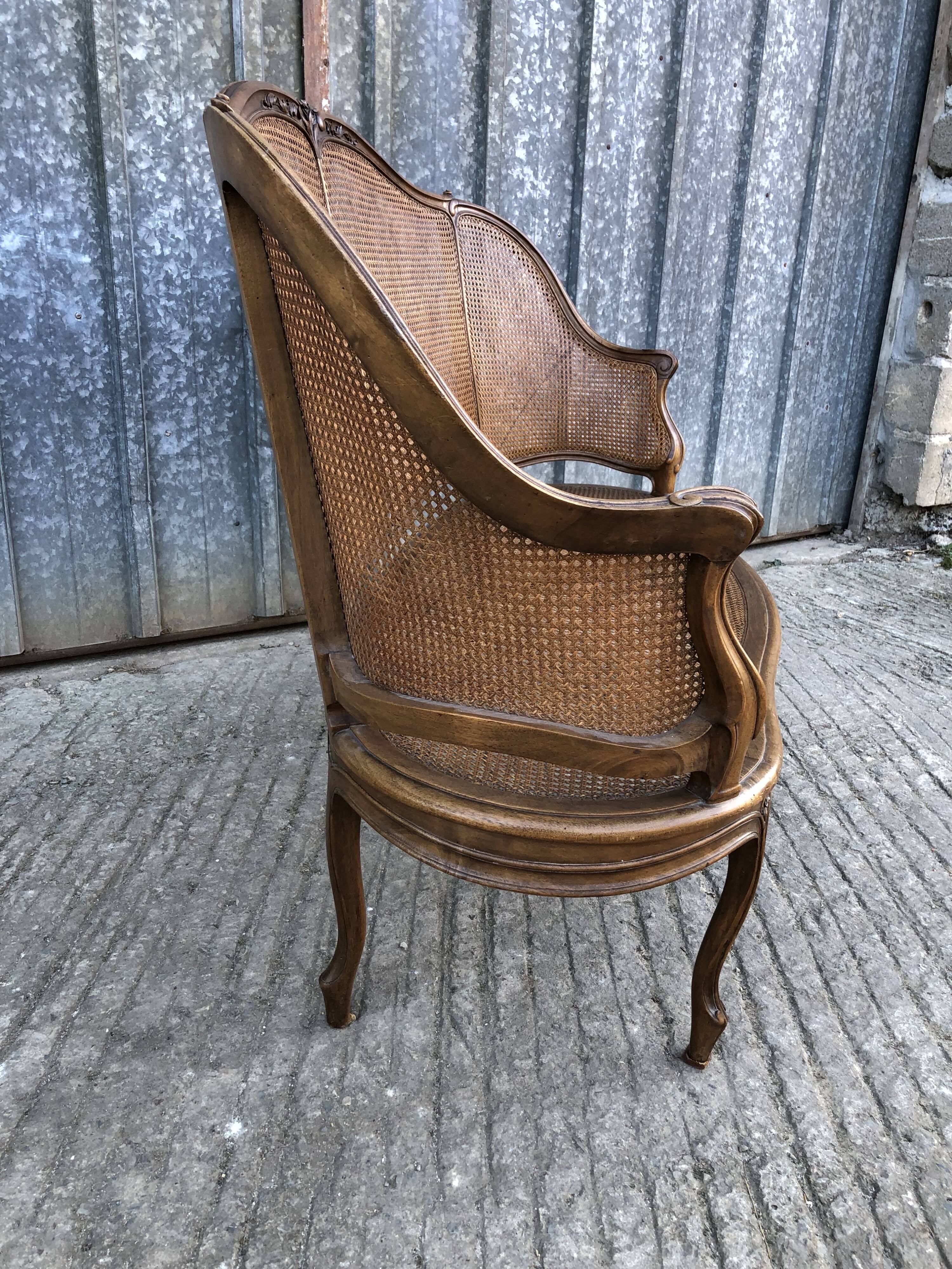Antique Louis XV bench in solid walnut and caning