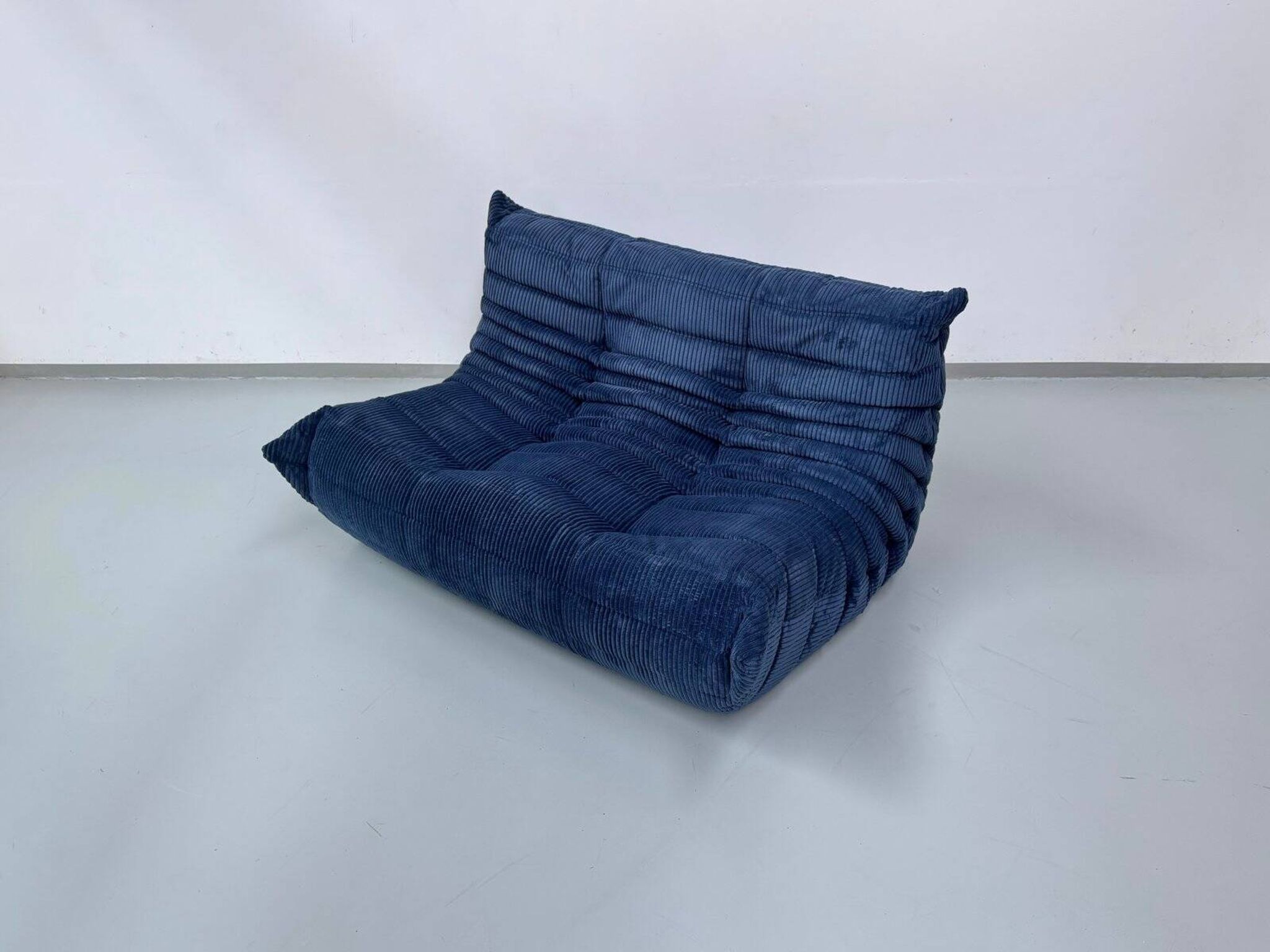French Togo 2-seater sofa in blue corduroy attributed to Michel Ducaroy for Ligne Roset, 1970s