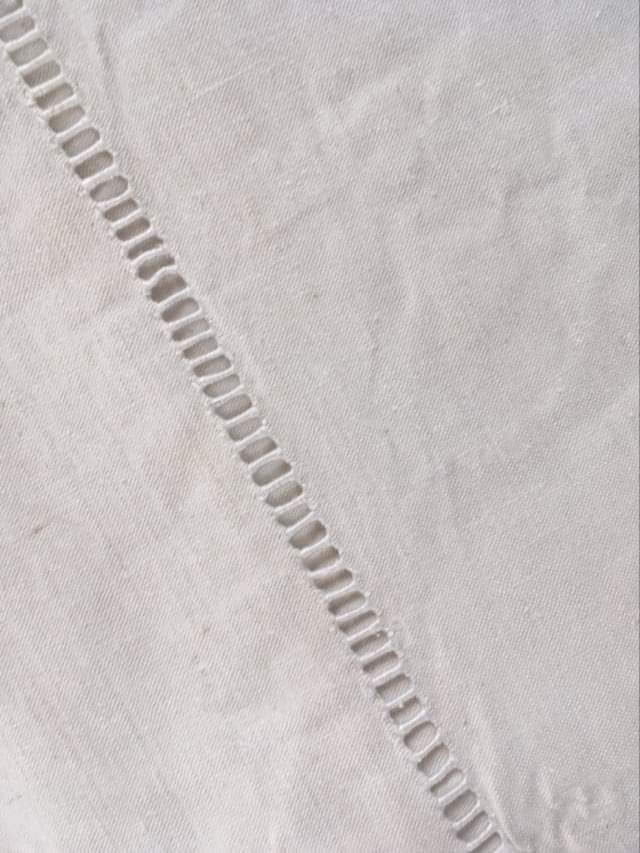 Mixed-race sheet with JPG monogram.