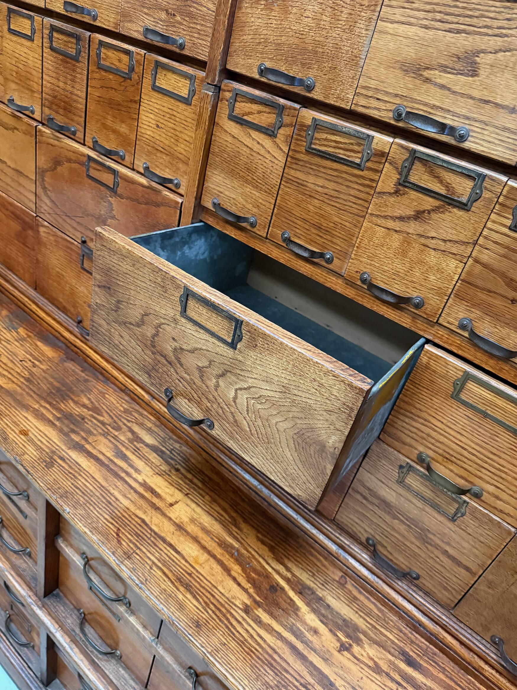 Antique very large American oak grain / apothecary cabinet, ca 1900