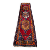 Long antique Persian carpet