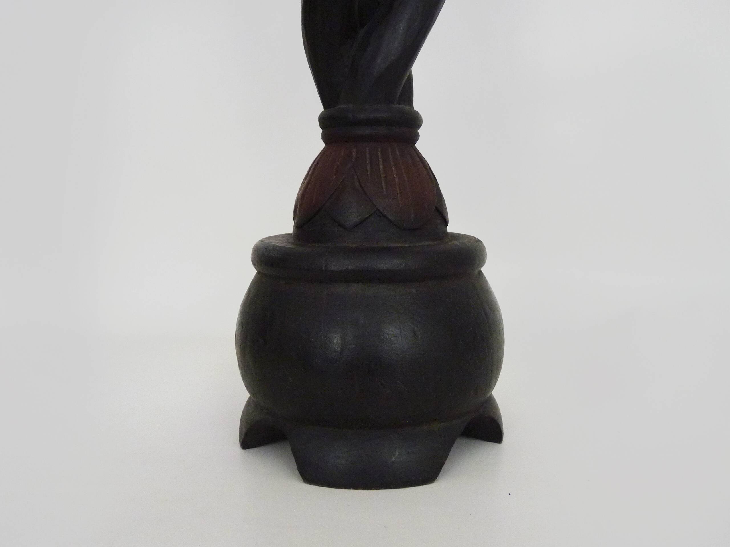 Twisted and engraved blackened wooden pedestal. 1960s 70s.