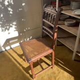 6 carved wooden chairs with cane seats