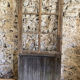 Old glazed wooden door patinated