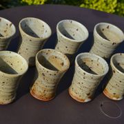 8 stoneware cups/mugs by Gustave Tiffoche
