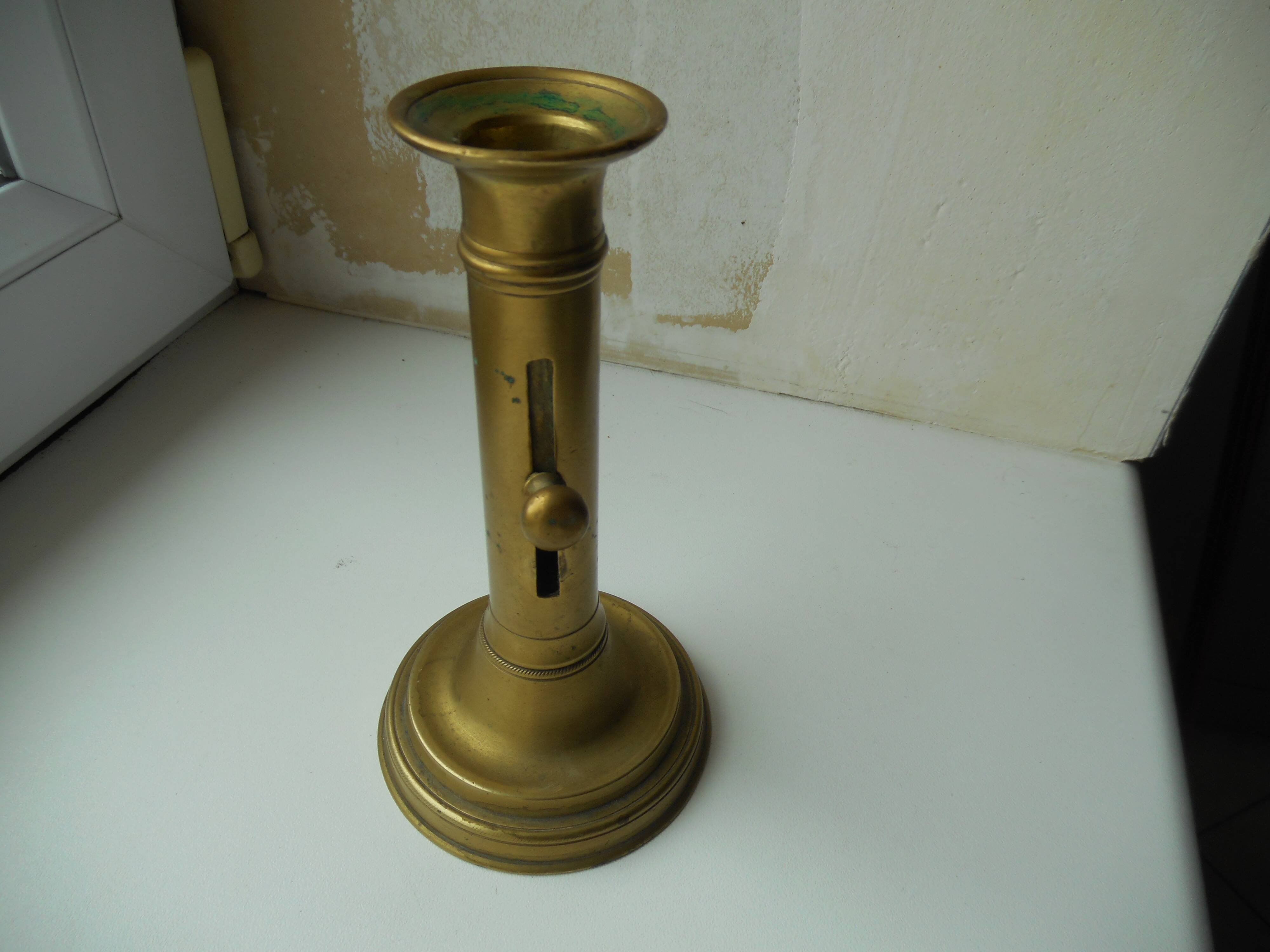 Old brass pusher