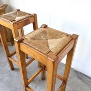 Pair of high stools in solid wood and woven straw Brutalist Style