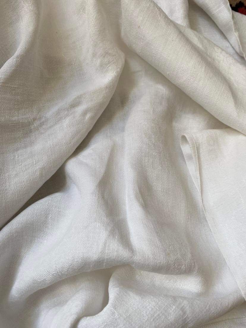 Old tablecloth in white cotton and monogram