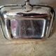 Antique metal and brass hand candle holder on rectangular base