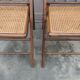 Pair of vintage wooden and cane folding chairs