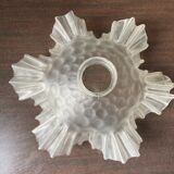 Transparent molded glass suspension in flower shape