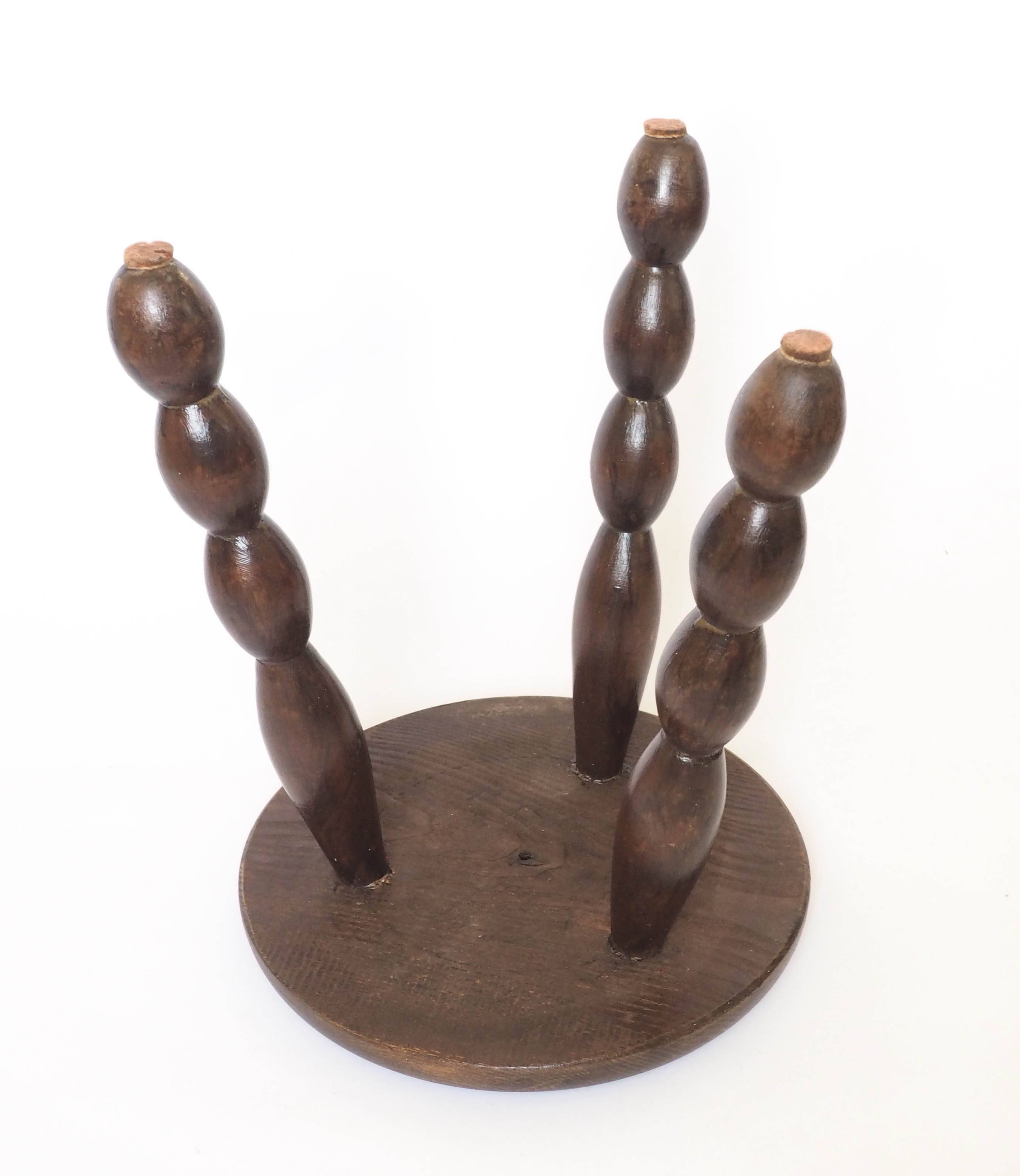 Beaded wooden tripod stool