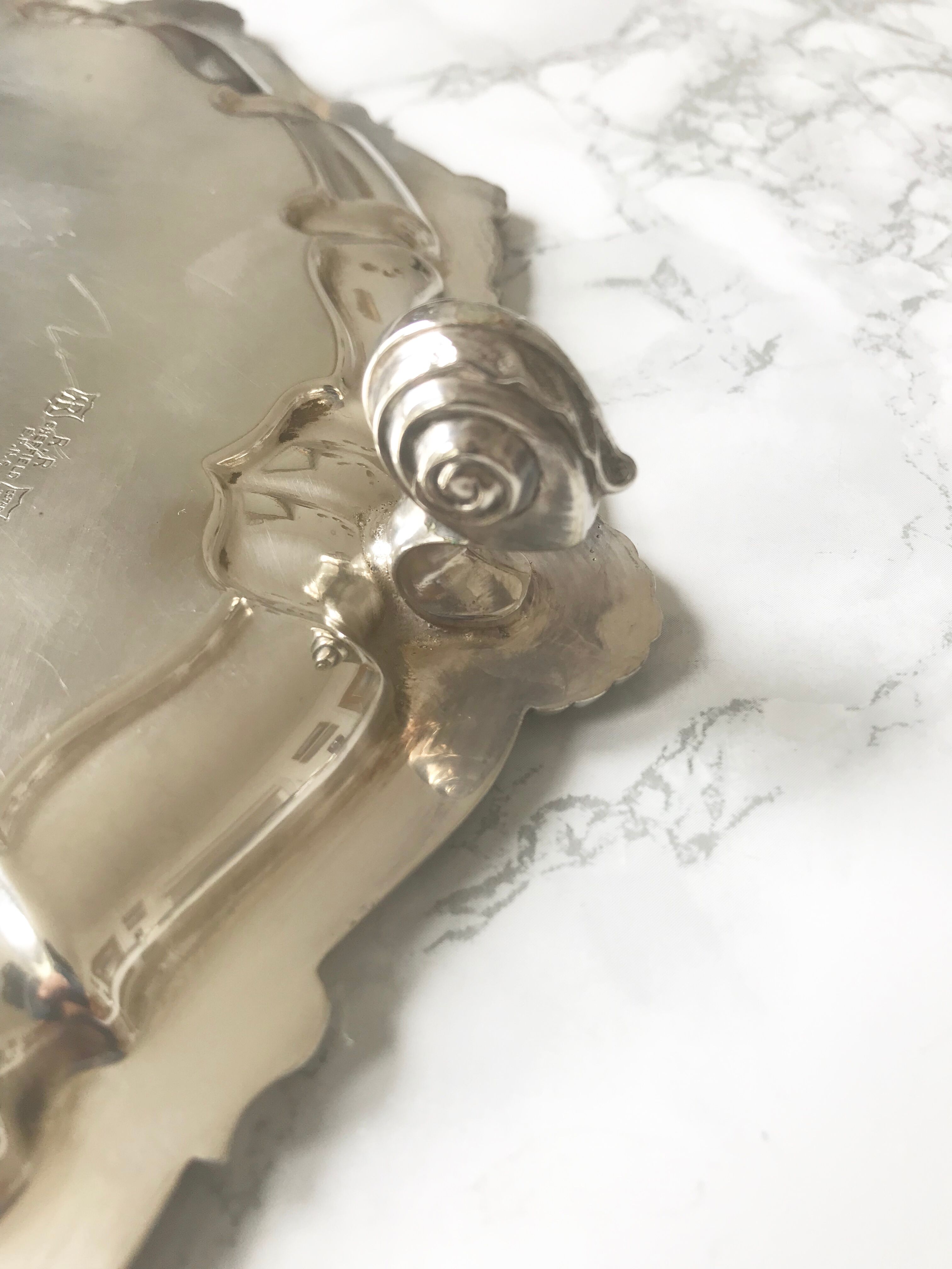 Antique silver metal platter with rockery décor