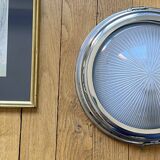 Thick glass ceiling light fixture with a chrome metal support, Holophane type.